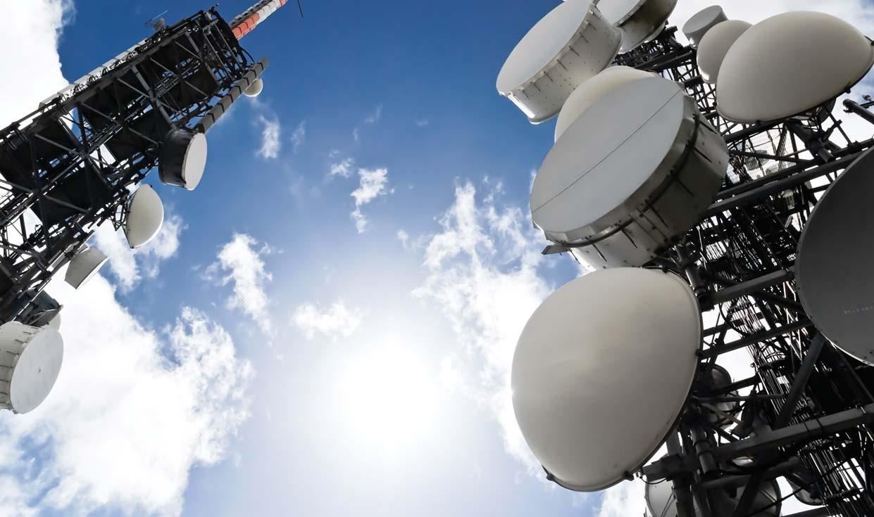 Microwave dishes and antennas on a telecom tower