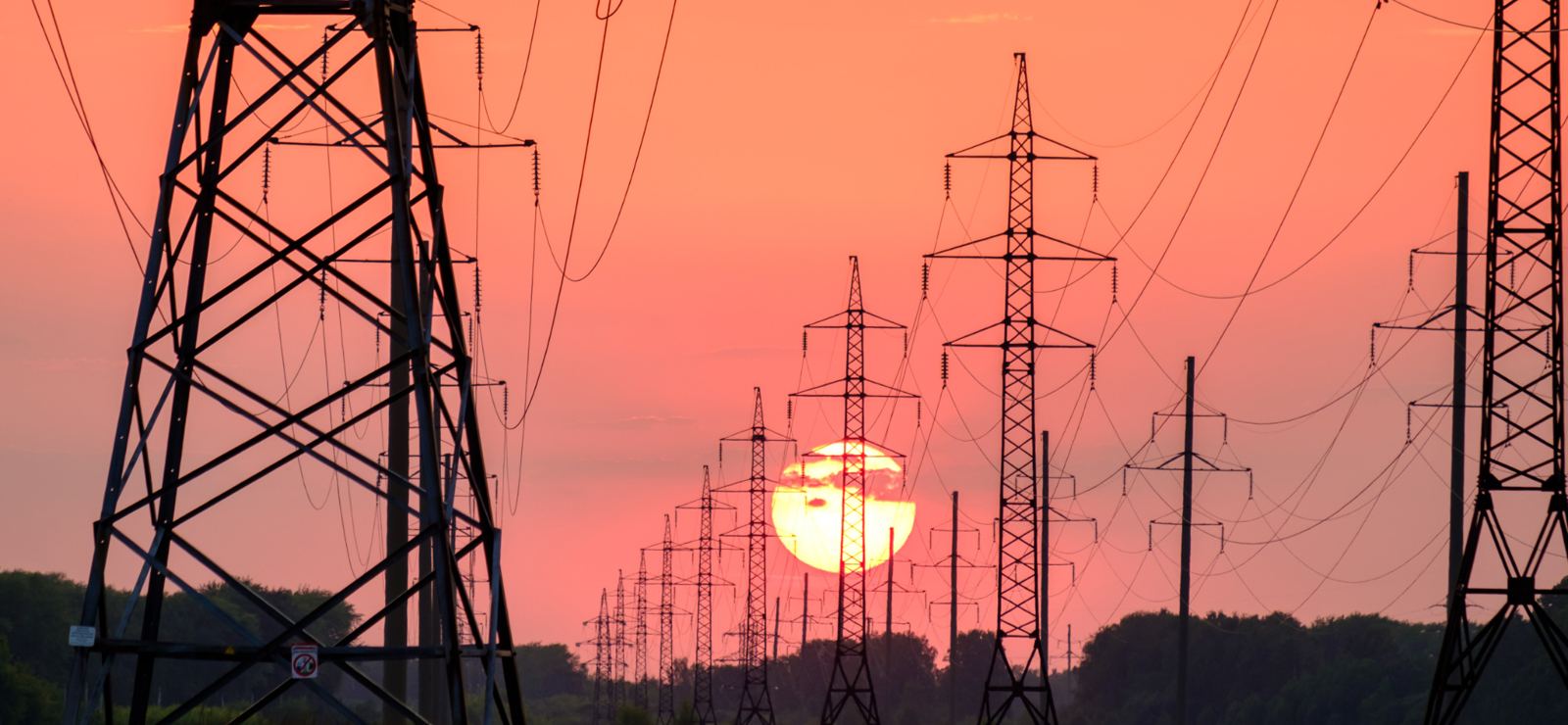 Power transmission lines at sunset